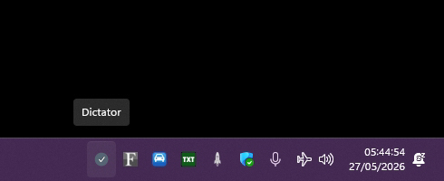 The Dictator icon sitting in the Windows 11 system tray with its tooltip visible